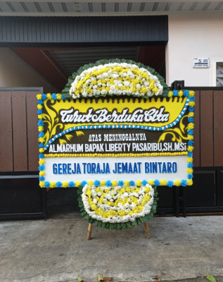 Papan Bunga Duka di Beoga
